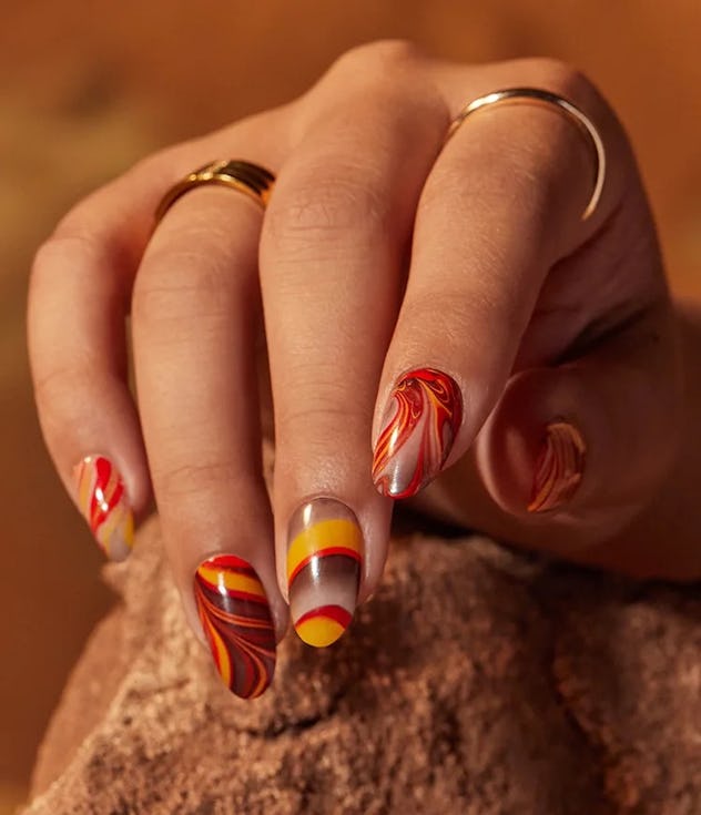 OPI nails called Earth, Wind and Fired Up with different OPI nail colors.