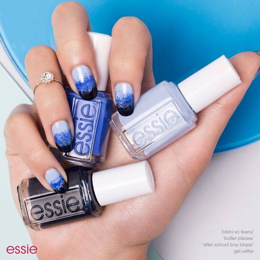 essie nail design called "get inked" that looks like the ocean, with a light blue ombre into dark bl...