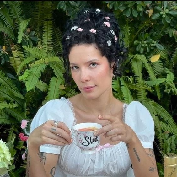 Halsey wore her curly hair in an updo with flower &amp; butterfly clips.