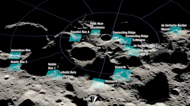 photo of cratered lunar surface with several blue rectangles highlighting possible landing sites
