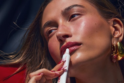 Hailey Bieber collaborated with Krispy Kreme for the rhode strawberry glaze peptide lip treatment.