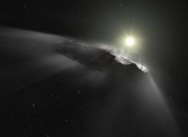 image of an elongated comet ejecting gasses passing in front of the sun