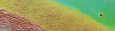 A topographical view of Lycus Sulci. The lower parts of the surface are colored blue and purple, lik...