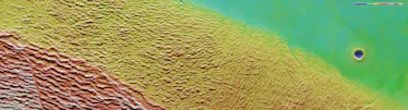 A topographical view of Lycus Sulci. The lower parts of the surface are colored blue and purple, lik...