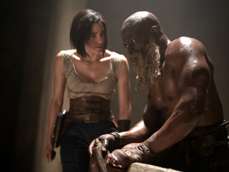 Sofia Boutella as Kora and Djimon Hounsou as Titus in Rebel Moon