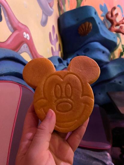 I tried the best Tokyo Disney snacks, including this Mickey Castella Cake. 