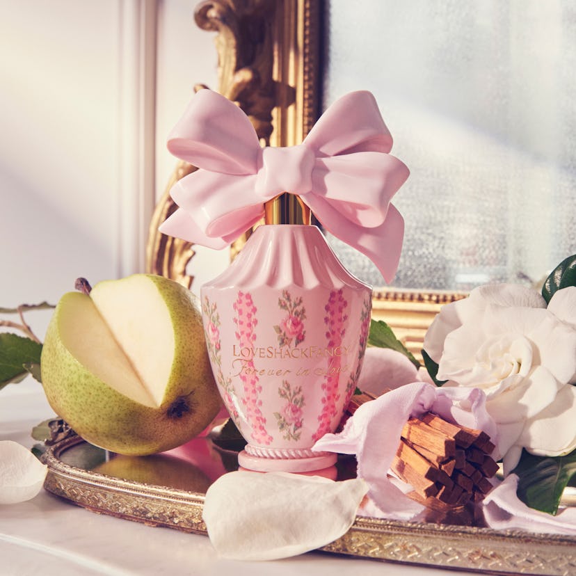 LoveShackFancy launched three floral perfumes on September 6, 2023. Here, Bustle's beauty writer rev...