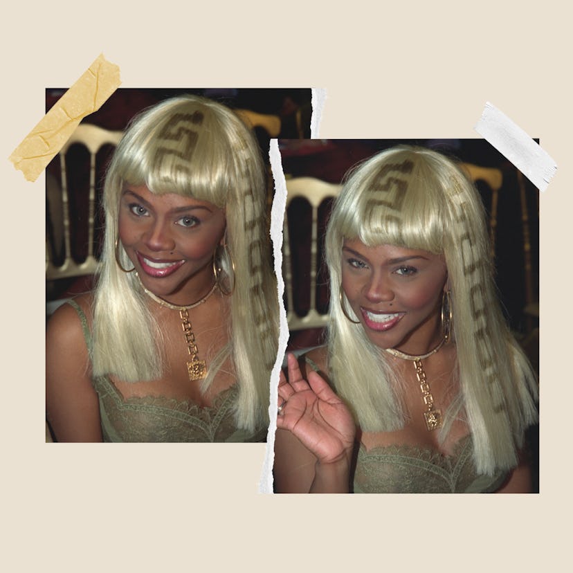 Rapper Lil' Kim debuted Versace & Chanel designer logo hair tattoos 22 years ago.