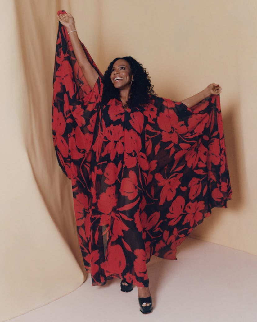 Ralph wears a Michael Kors dress; Jemma Wynne earrings; Pomellato bracelet; Christian Louboutin shoe...