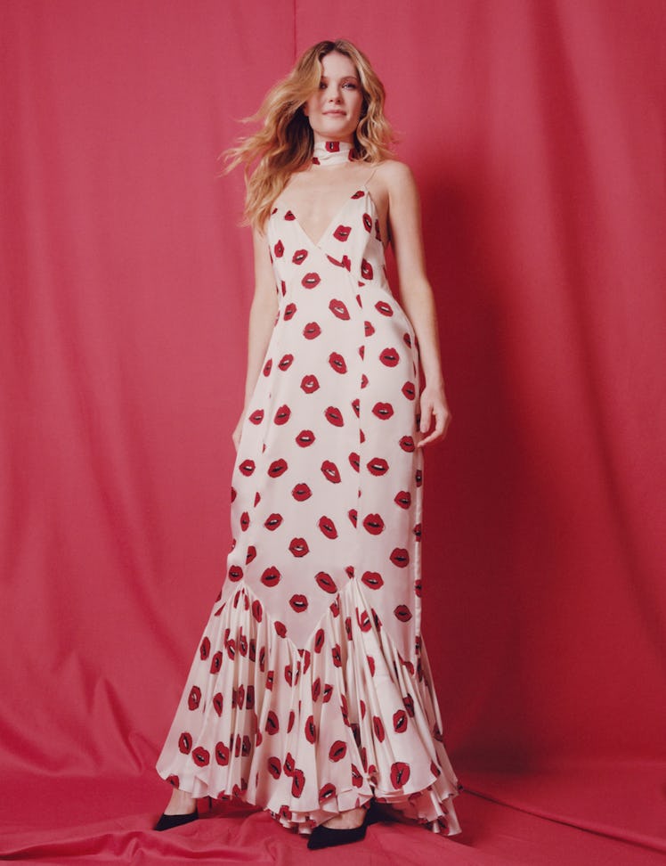 Fahy wears a Khaite dress and scarf; Christian Louboutin shoes.