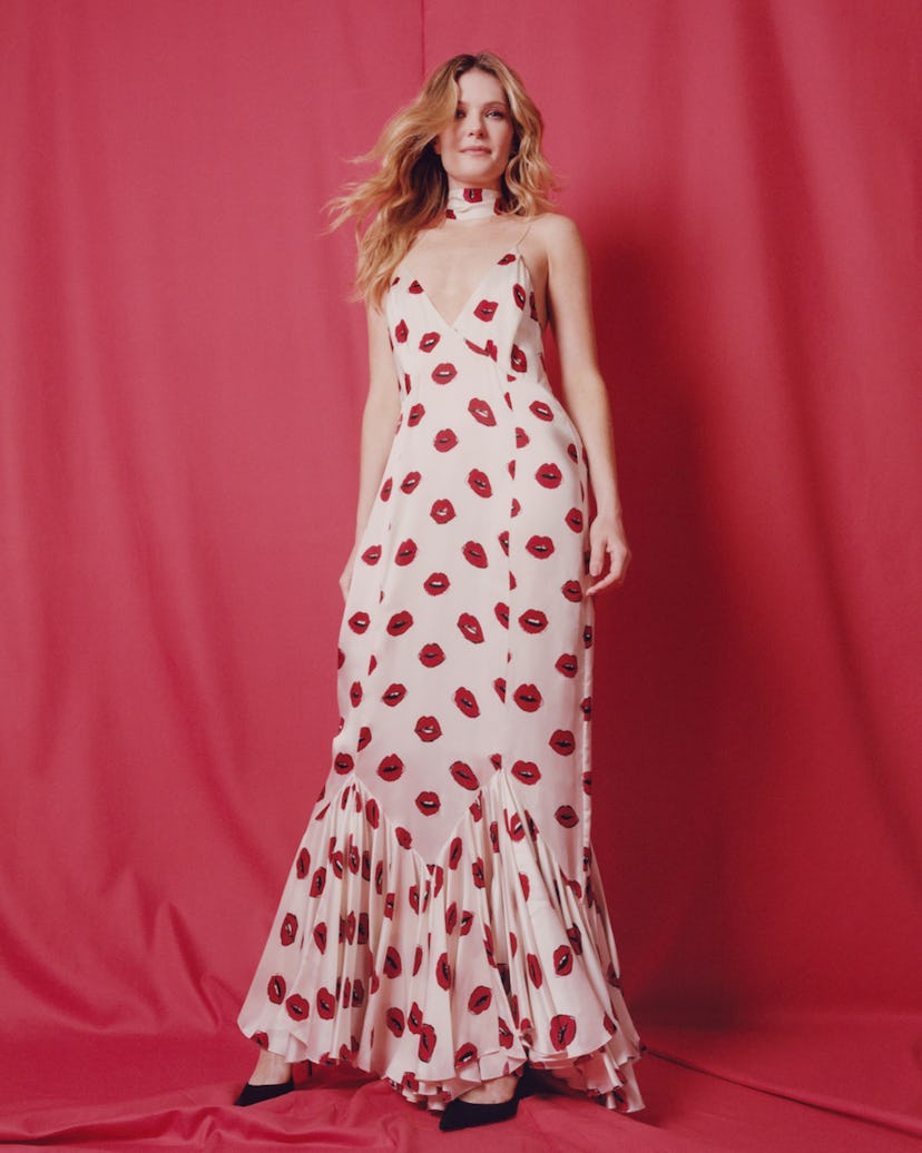 Fahy wears a Khaite dress and scarf; Christian Louboutin shoes.