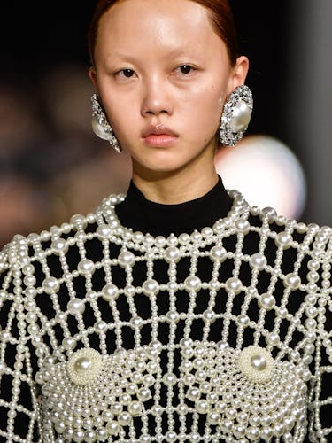 A model walks the runway during the Balmain Ready to Wear Fall/Winter 2023-2024 fashion show as part...