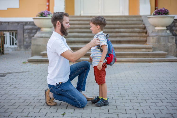 A dad dropping off his summer baby for Kindergarten.