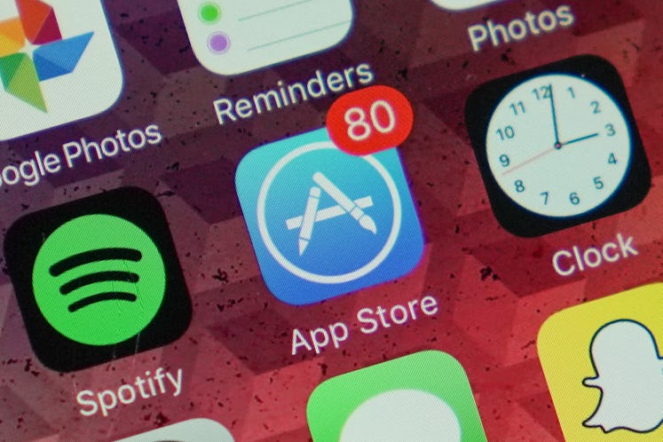 An App Store icon showing 80 app updates waiting to be installed on an iPhone