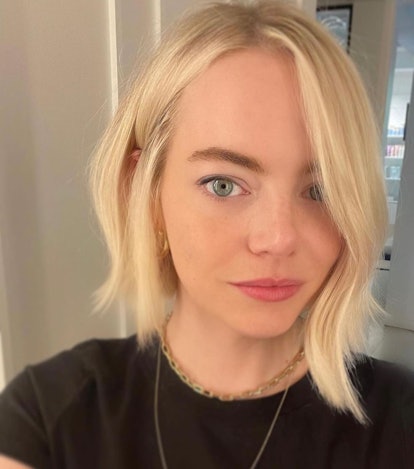 Emma Stone debuts new bleach blonde hair color, via stylist Mara Roszak
