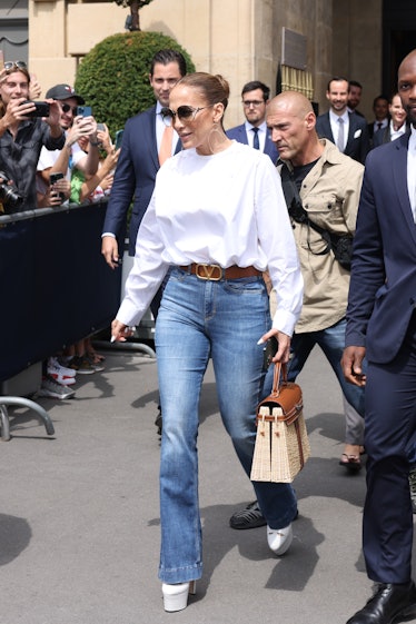 Jennifer Lopez with wicker bag. 
