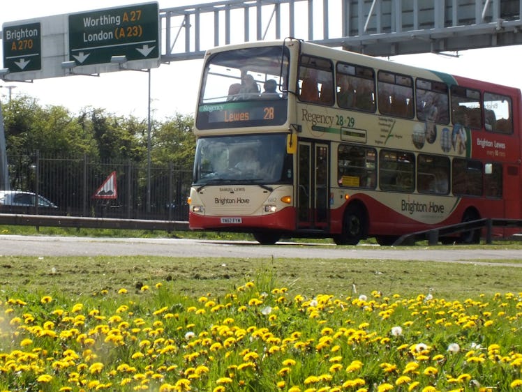 a double decker bus on a british highway