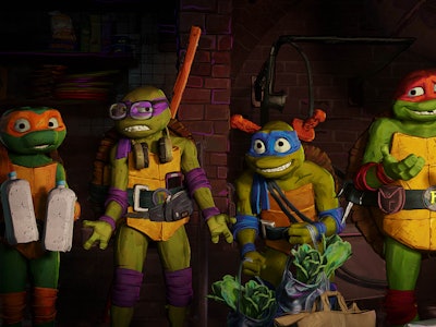 Michelangelo, Donatello, Leonardo, and Raphael stand together in 'TMNT: Mutant Mayhem'