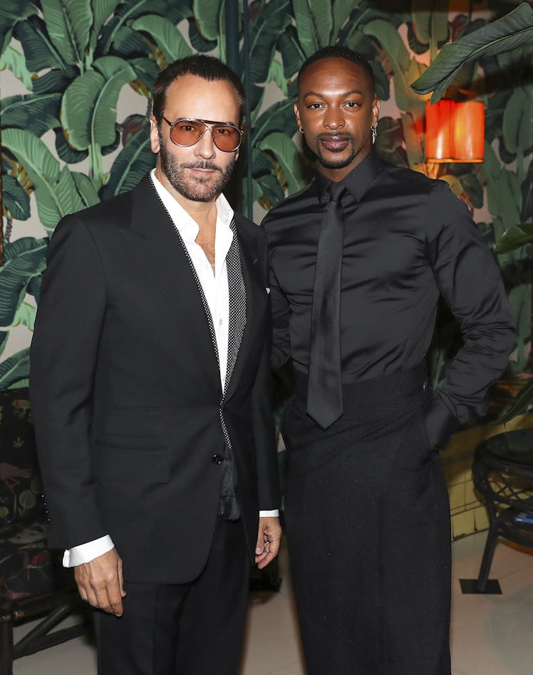 Fashion Designers Tom Ford & Laquan Smith pose together.
