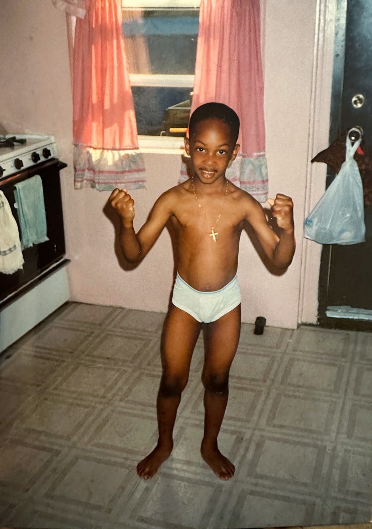 Designer LaQuan Smith, at age 5, showed off his muscles.