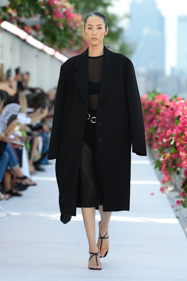 Model on the runway at Michael Kors Spring 2024 Ready To Wear Fashion Show at Domino Park on Septemb...
