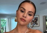 Selena Gomez shared a selfie in a bodysuit that showed makeup, perfume, & skin care products on her ...
