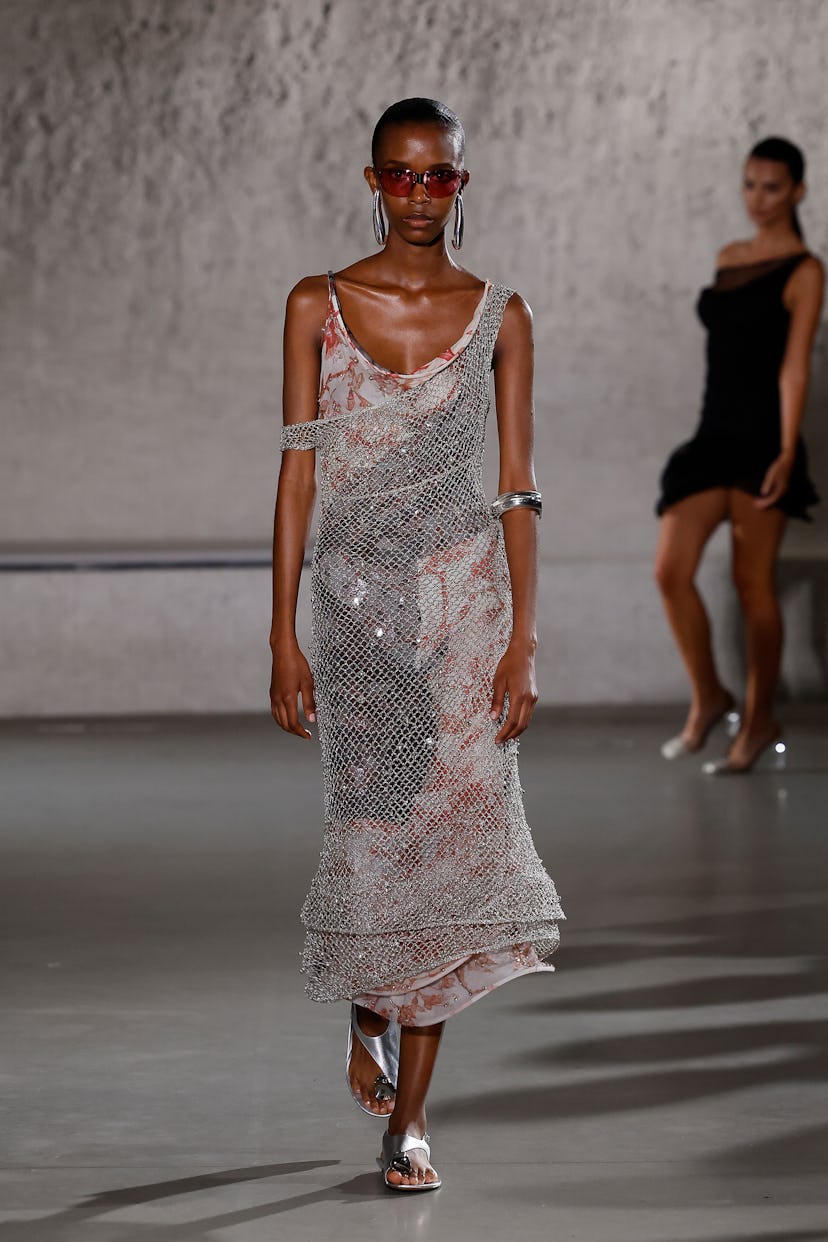 Model on the runway at Tory Burch Spring 2024 Ready To Wear Fashion Show at the American Museum of N...