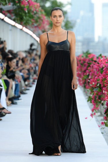 Irina Shayk on the runway at Michael Kors Spring 2024 Ready To Wear Fashion Show at Domino Park on S...