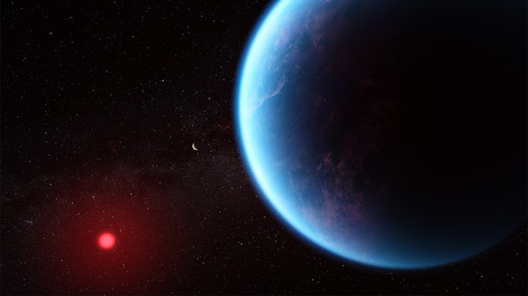a large blue planet in the foreground with a small red star in the background