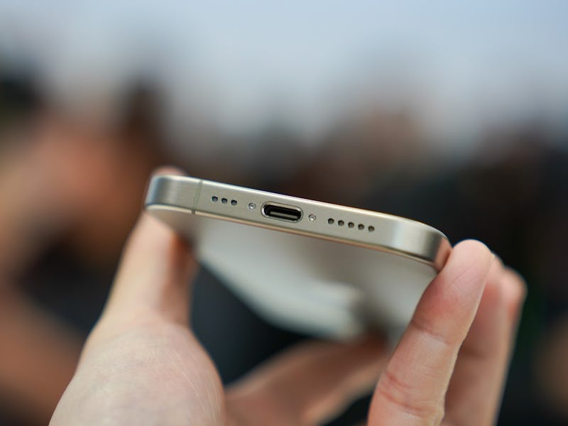 An iPhone 15 with USB-C port.