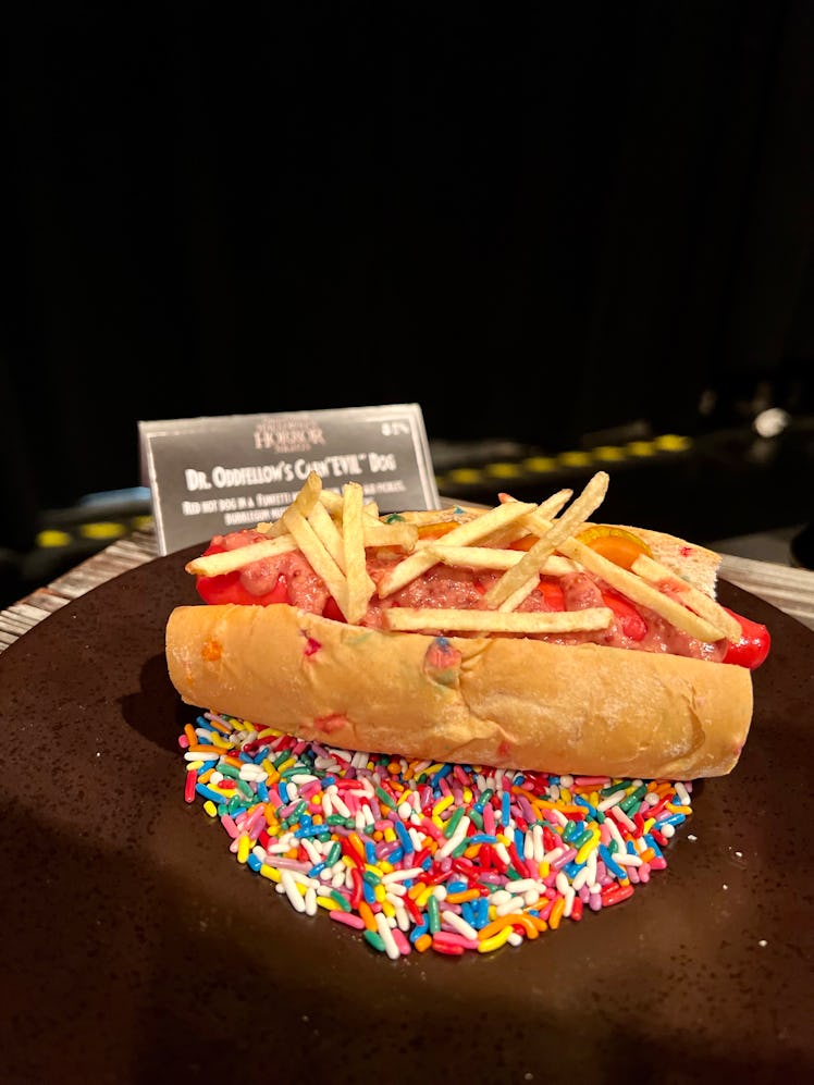 The Carn "Evil" Dog at Halloween Horror Nights 2023 is a hot dog with Kool-Aid-pickles and bubblegum...