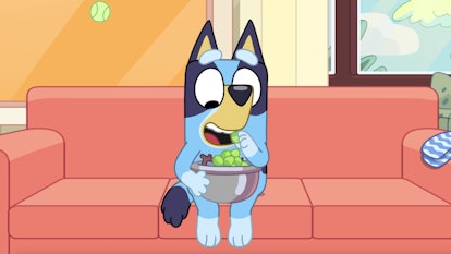 Bluey eating a bowl of grapes in "Housework."