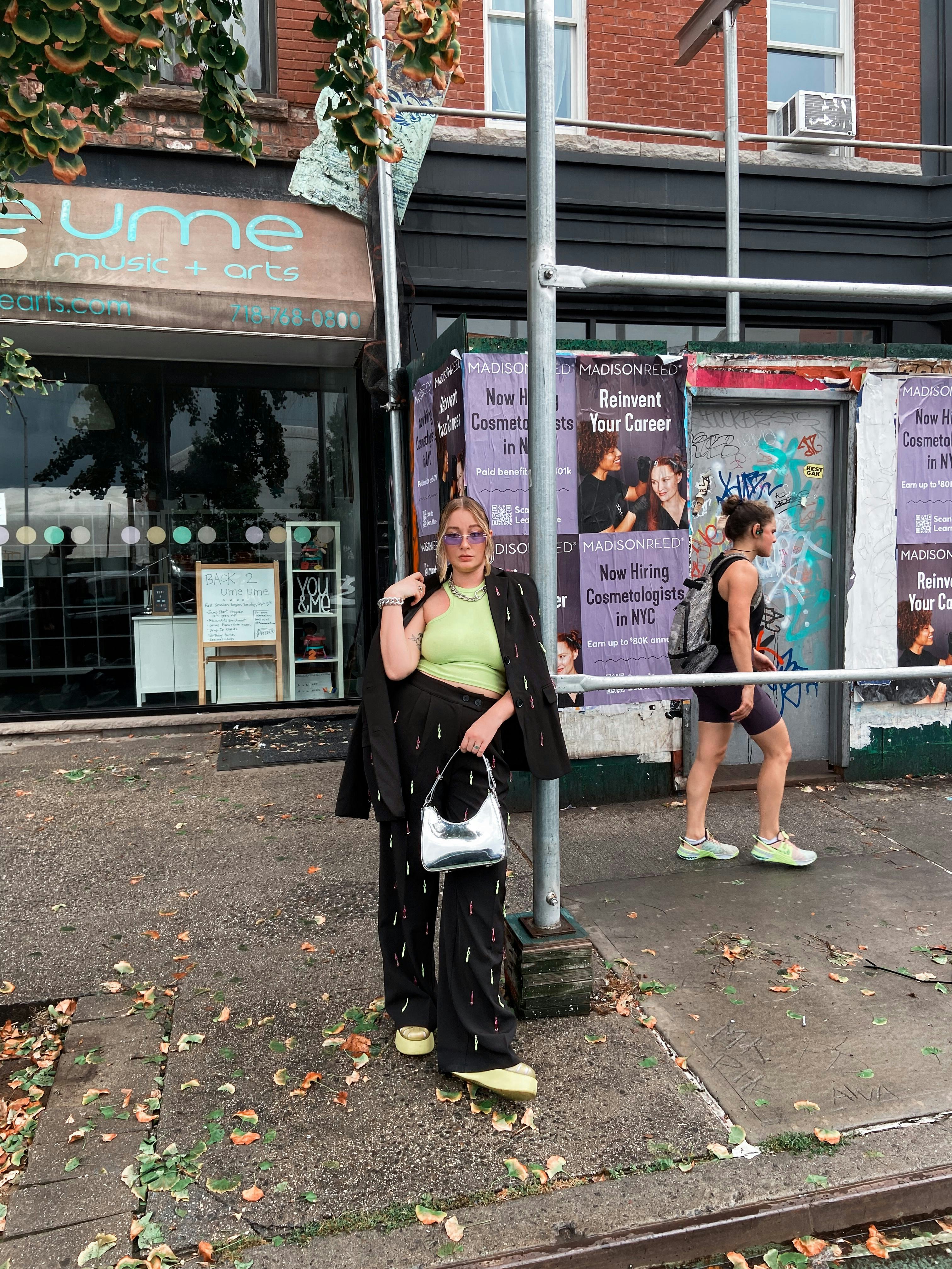 kelsey stiegman wears a black suit and platform fisherman sandals for new york fashion week septembe&hellip;