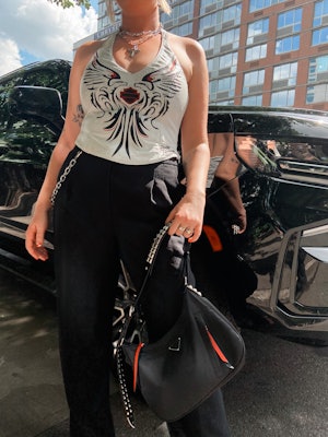 kelsey stiegman wears a vintage leather harley davidson corset and trousers at new york fashion week...