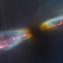 Herbig-Haro object 211 is a protostar with two jets blasting out and mingling with gas and dust in i...