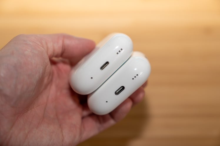The Lightning AirPods Pro 2 (top) versus the new USB-C AirPods Pro 2 (bottom).