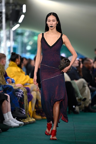 A model walks the runway at the Burberry show during London Fashion Week September 2023 at on Septem...