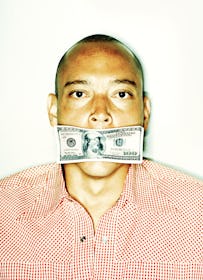 Portrait of man with hundred dollar bill covering his mouth.
