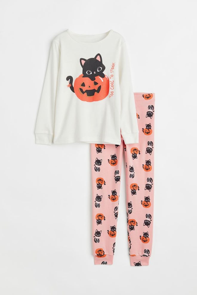 Toddler halloween pajamas with a cat in a jack-o-lantern