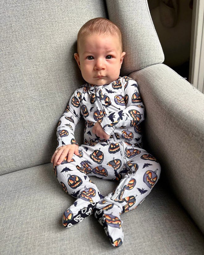 Baby halloween footie pajamas with spooky pumpkin pattern