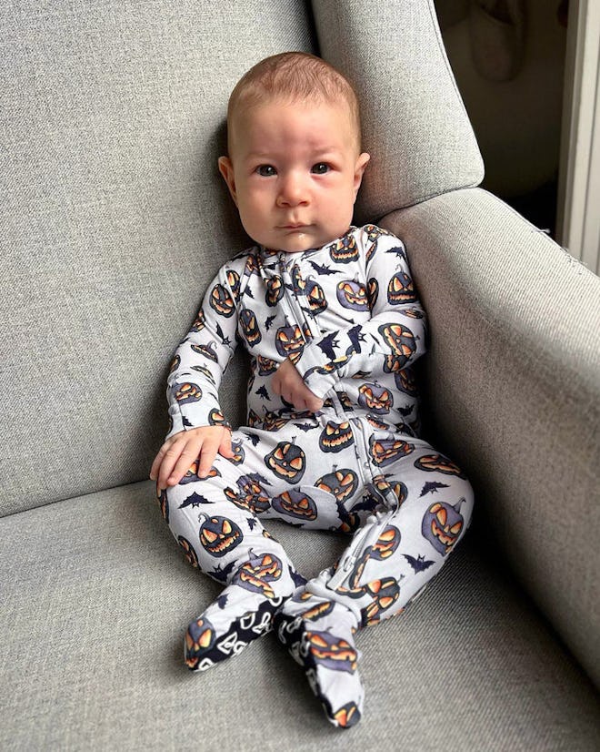Baby halloween footie pajamas with spooky pumpkin pattern