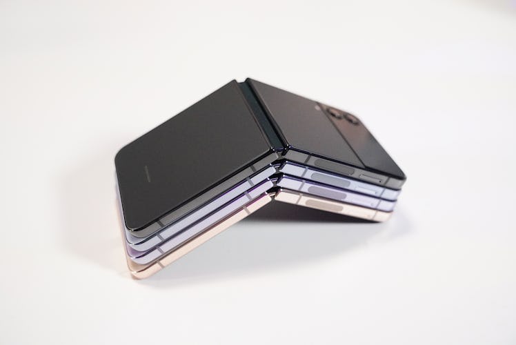 Four Samsung Galaxy Z Flip 4 phones stacked together