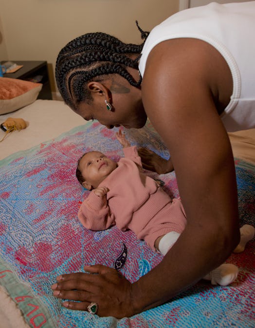A$AP Rocky looking at his son Riot Rose. 