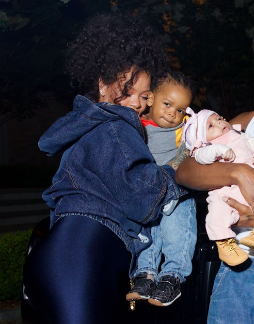 Rihanna snuggling her son RZA.