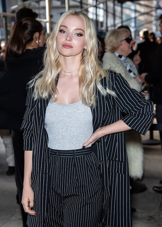 Dove Cameron with pearl blonde hair.