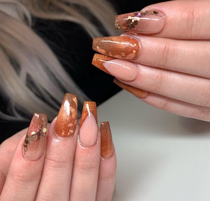This sparkly copper mani would look so good holding your caramel macchiato.