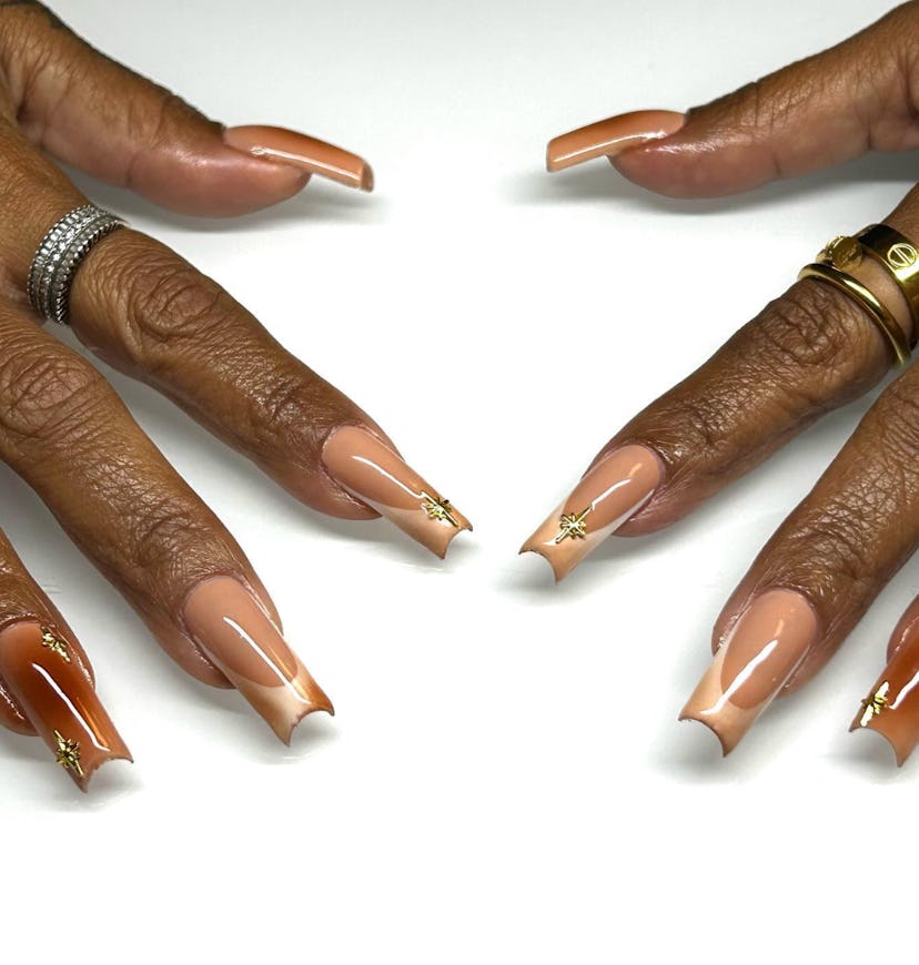 Caramel polish looks extra autumnal on French tips.