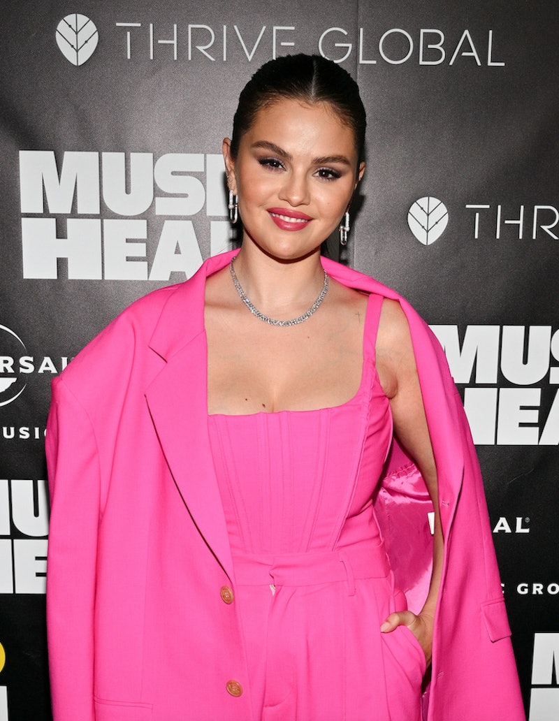 Selena Gomez wore a pink suit, bustier top, and trousers at the Music + Health Summit.