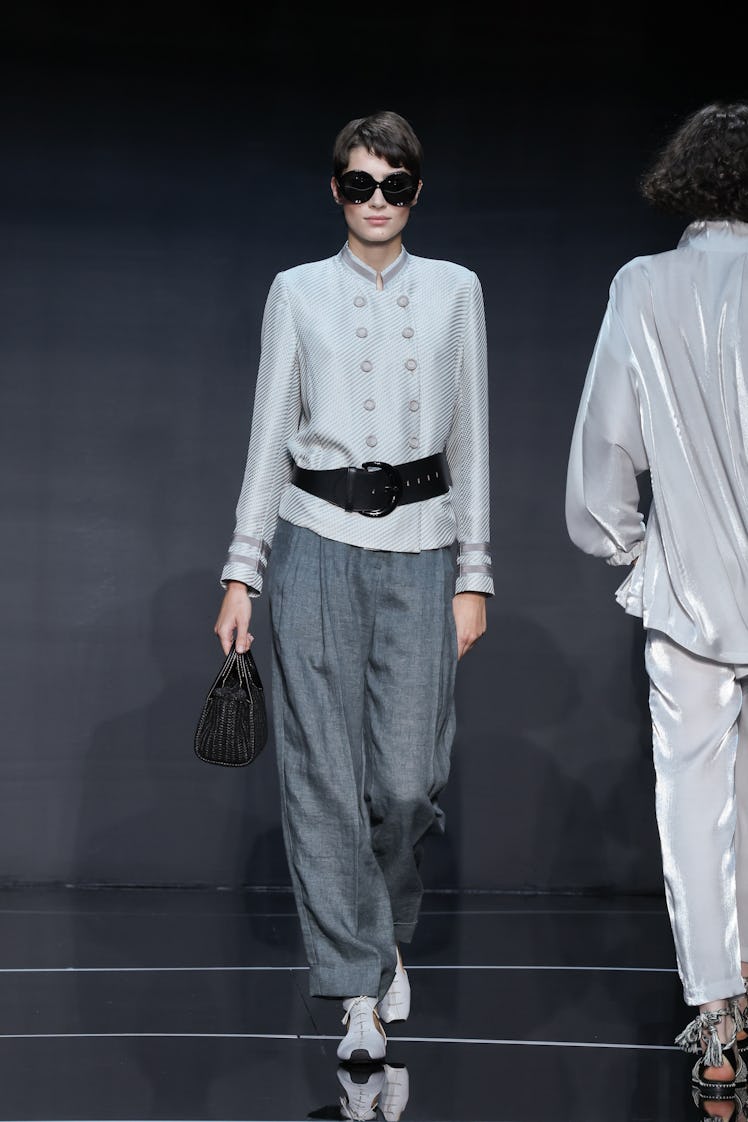 A model walks the runway at the Emporio Armani fashion show during the Milan Fashion Week Womenswear...