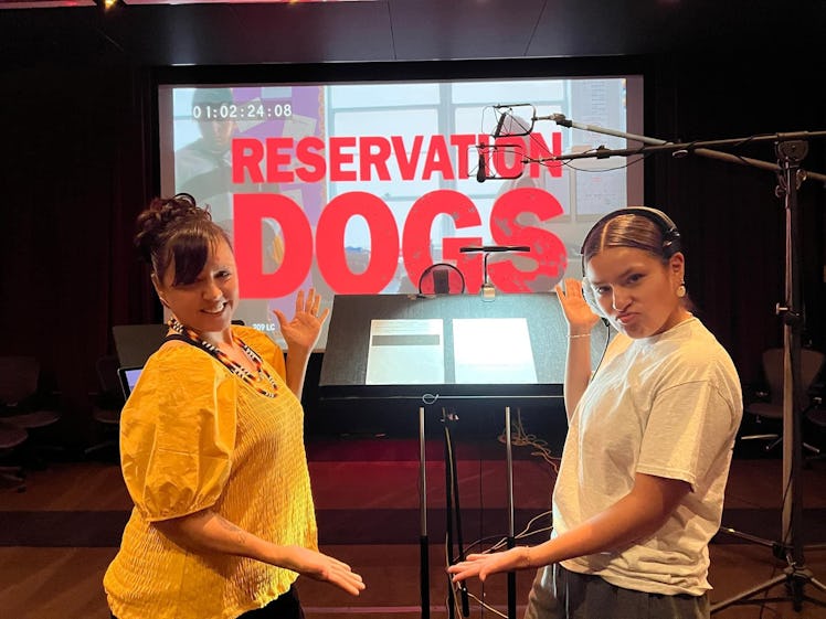 Paulina Alexis (R) with her mom, Yvette Alexis (L), gesturing at the RESERVATION DOGS title card bet...